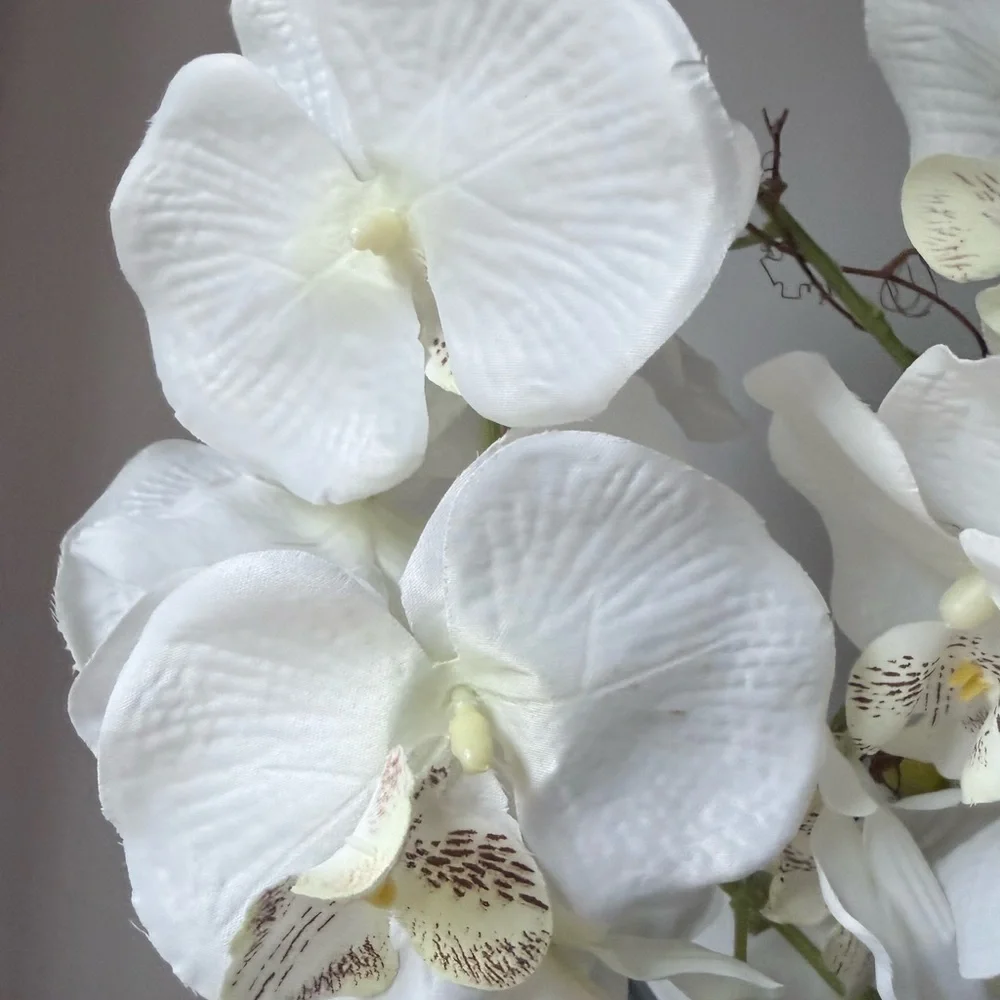 artificial white Phalaenopsis orchid arrangement in a brown textured vase 27”….
